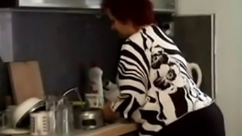 Chubby Granny Gets Intimate In The Kitchen