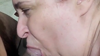 Chubby Mature Receives A Delivery And Gives The Young Delivery Man A Blowjob
